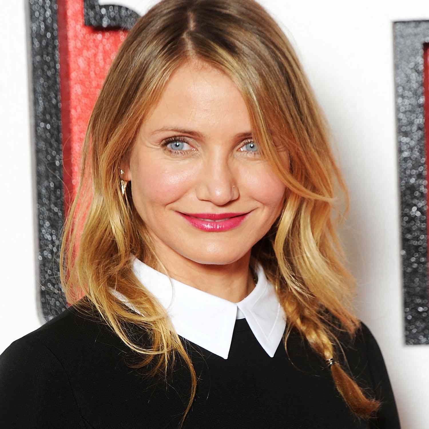 Cameron Diaz wears a loose braided hairstyle with loose face-framing layers