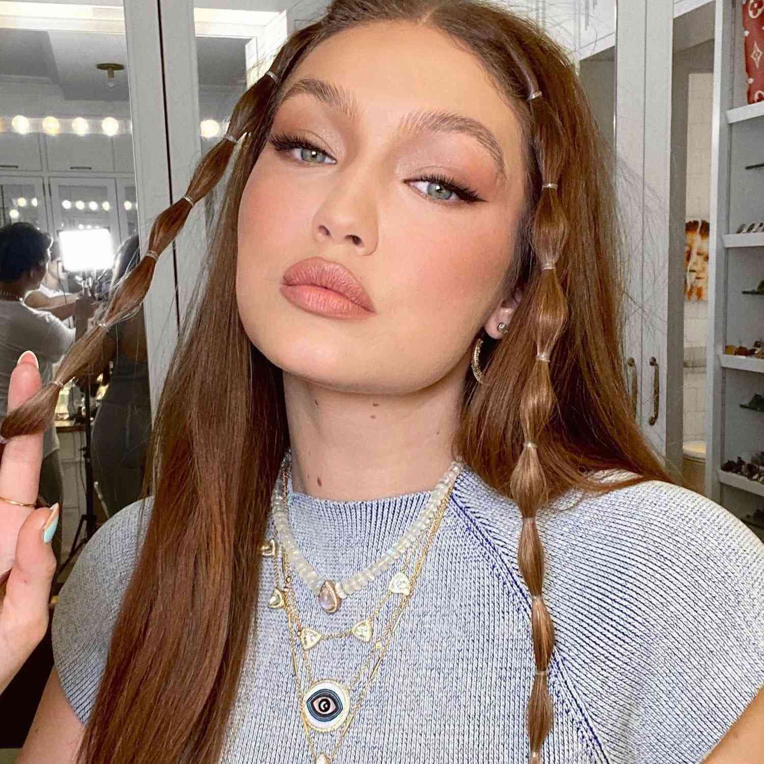 Gigi Hadid with face-framing bubble accent pieces
