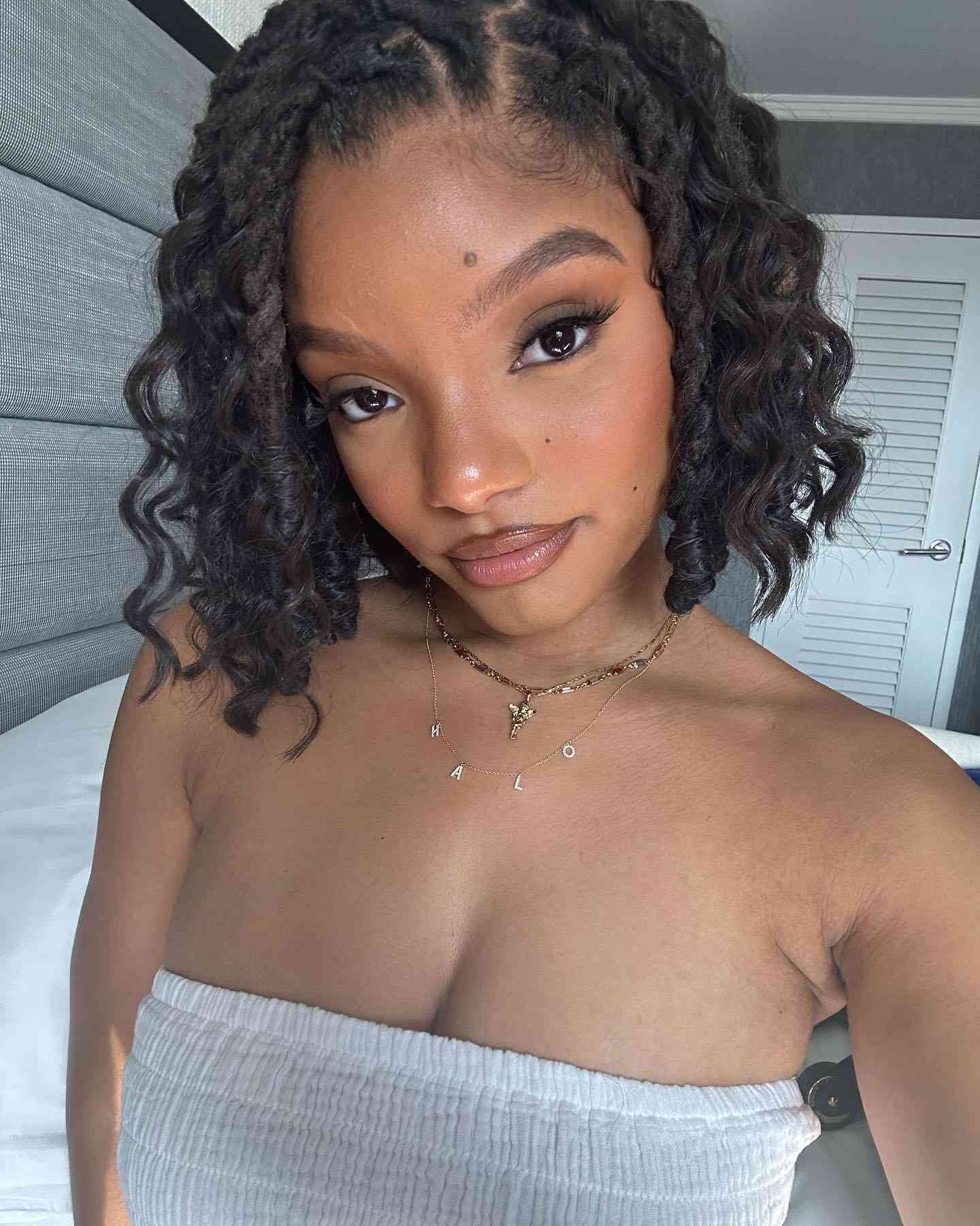 Halle Bailey with a curly bob
