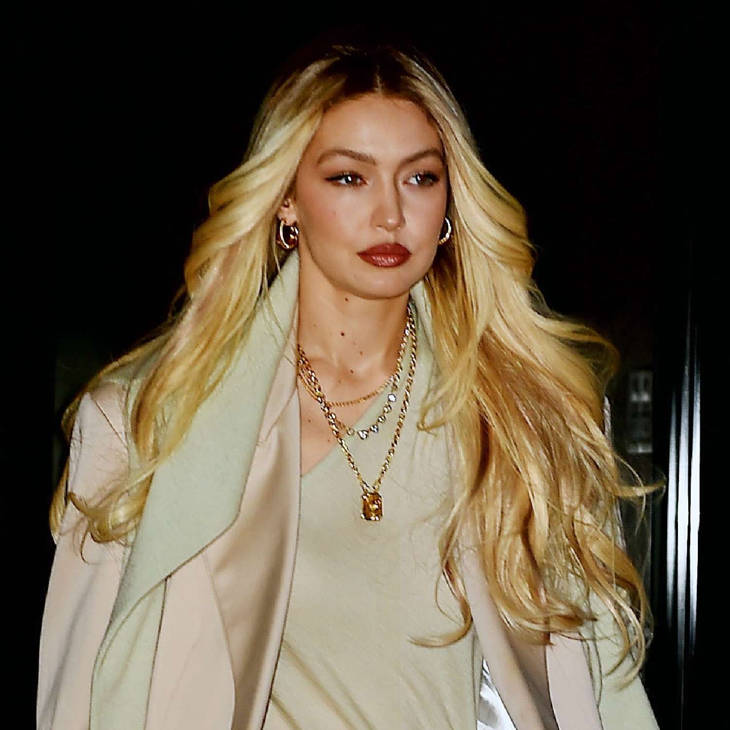 Gigi Hadid wears a long hairstyle with bouncy, curled layers