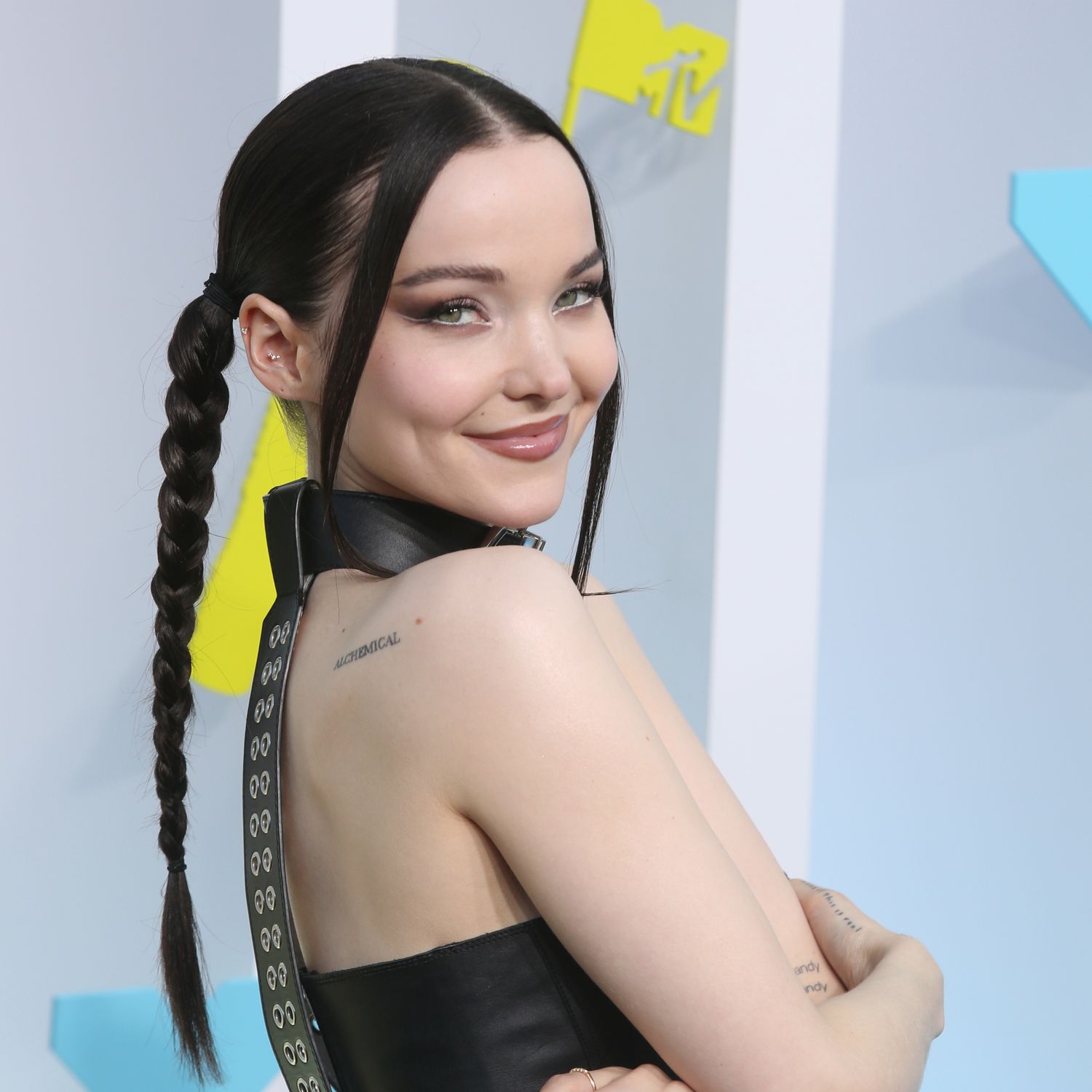 Dove Cameron at the VMAs wearing pigtails