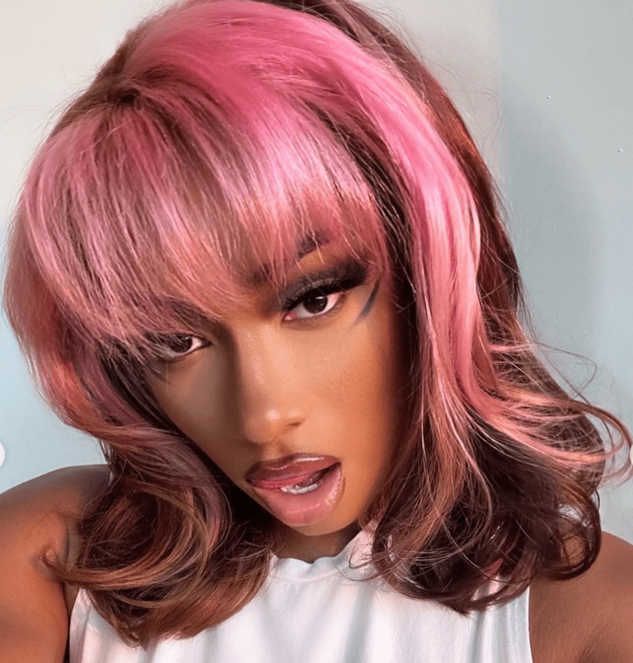 Megan Thee Stallion wears her grown out bob with pink money pieces