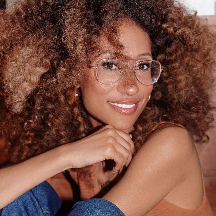 Elaine Welteroth with multi-toned auburn hair.