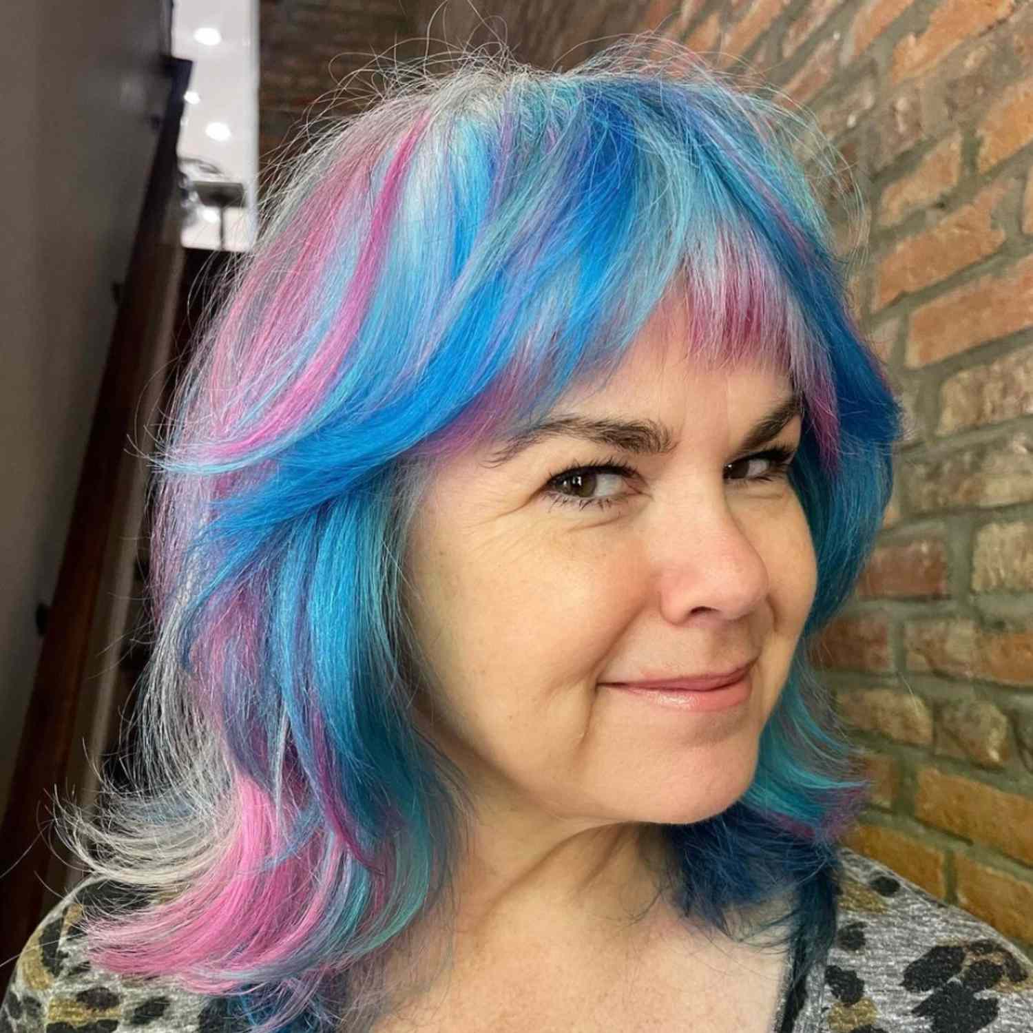 Blue and pink cotton candy-colored hair.