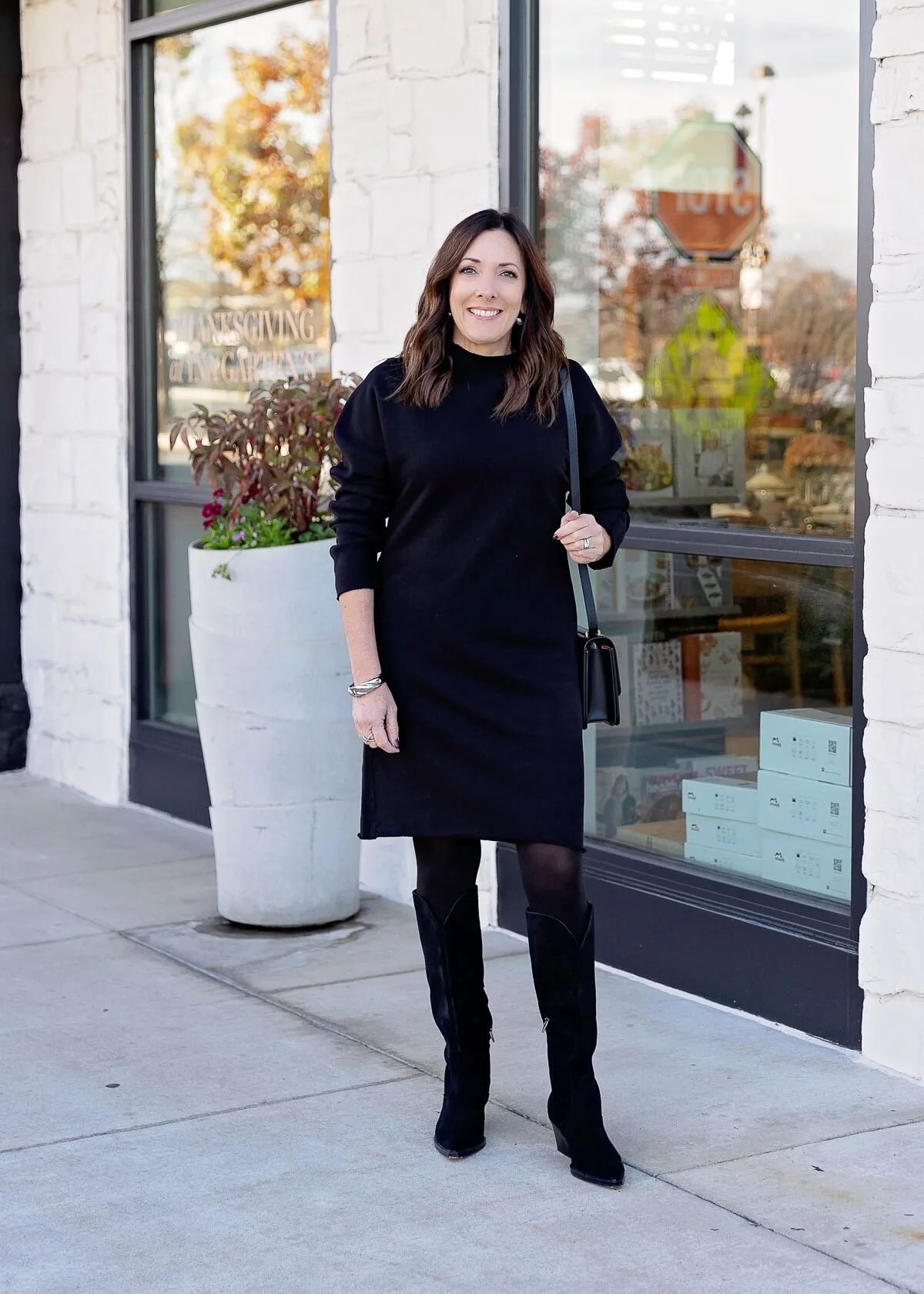 Jo-Lynne Shane wearing Frank & Eileen Izzie Dress with black tights and boots