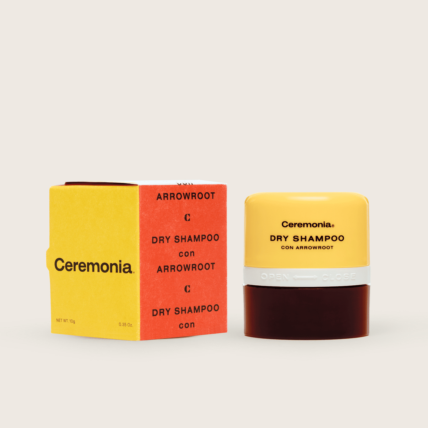 Yellow and orange box next to a small container with Ceremonia label