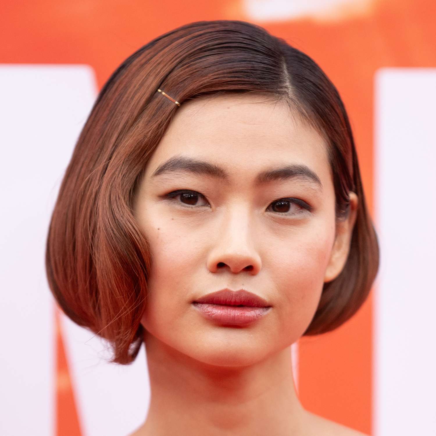 Hoyeon Jung wears a micro bob with old hollywood volume at her ends